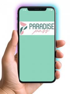 A hand holding a smartphone with the paradise pass logo displayed on the screen.
