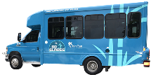 A blue shuttle bus with tinted windows and white graphics, parked on a white background.