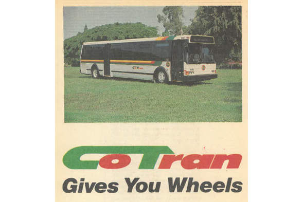 A Cotran city bus is parked on grass with trees in the background. Text below reads: "CoTran Gives You Wheels.