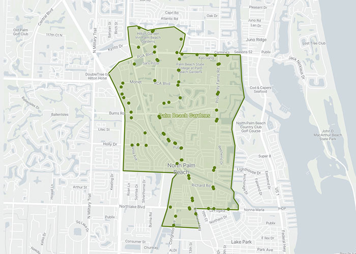 Map showing the outlined area of North Palm Beach, Florida, with green dots marking specific locations within the highlighted region.
